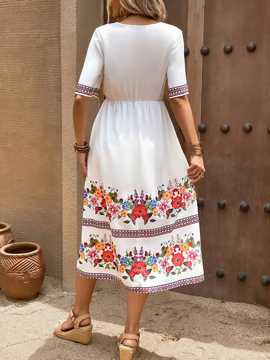 Elegantes Kleid mit V-Ausschnitt, langen Ärmeln und Paisley-Motiv