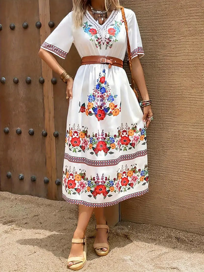 Elegantes Kleid mit V-Ausschnitt, langen Ärmeln und Paisley-Motiv